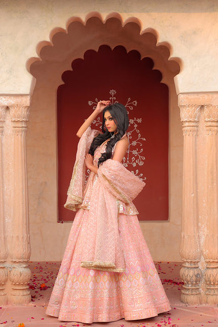 Yashira Peplum Peach Lehenga