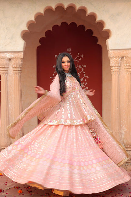 Yashira Peplum Peach Lehenga