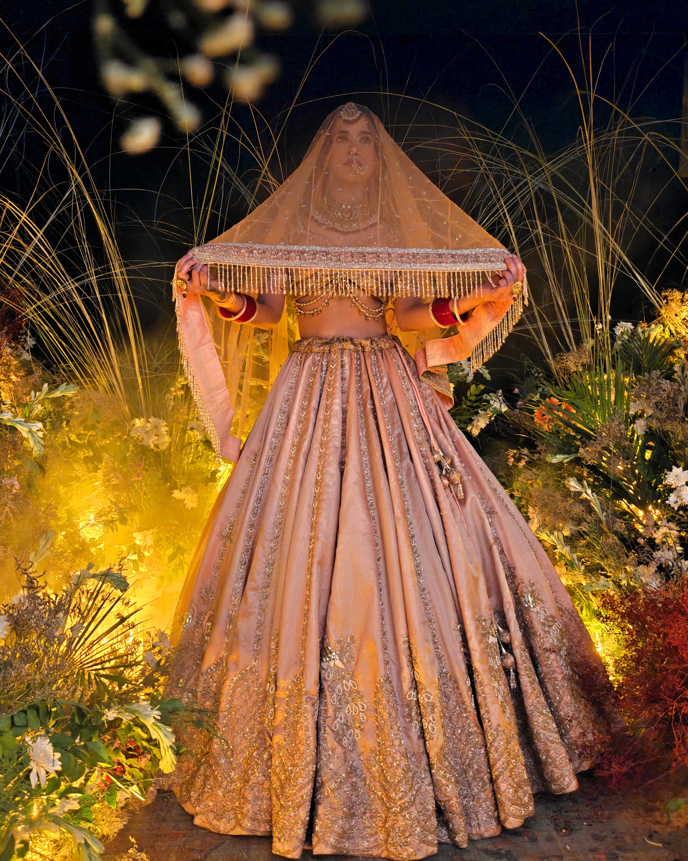 Aabida peach tissue bridal lehenga, hand embroidered by Amaltas Couture, front view