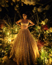 Noorie gold georgette bridal lehenga, back view, Amaltas Couture