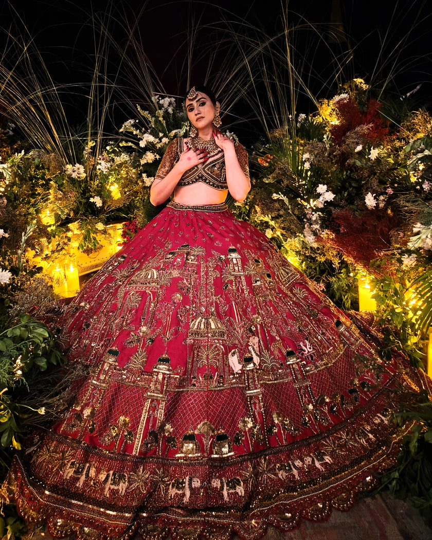 Aroosa red silk bridal lehenga with organza dupatta with green velvet border, Amaltas Couture