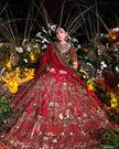 Aroosa red silk bridal lehenga, hand embroidered by Amaltas Couture, front view