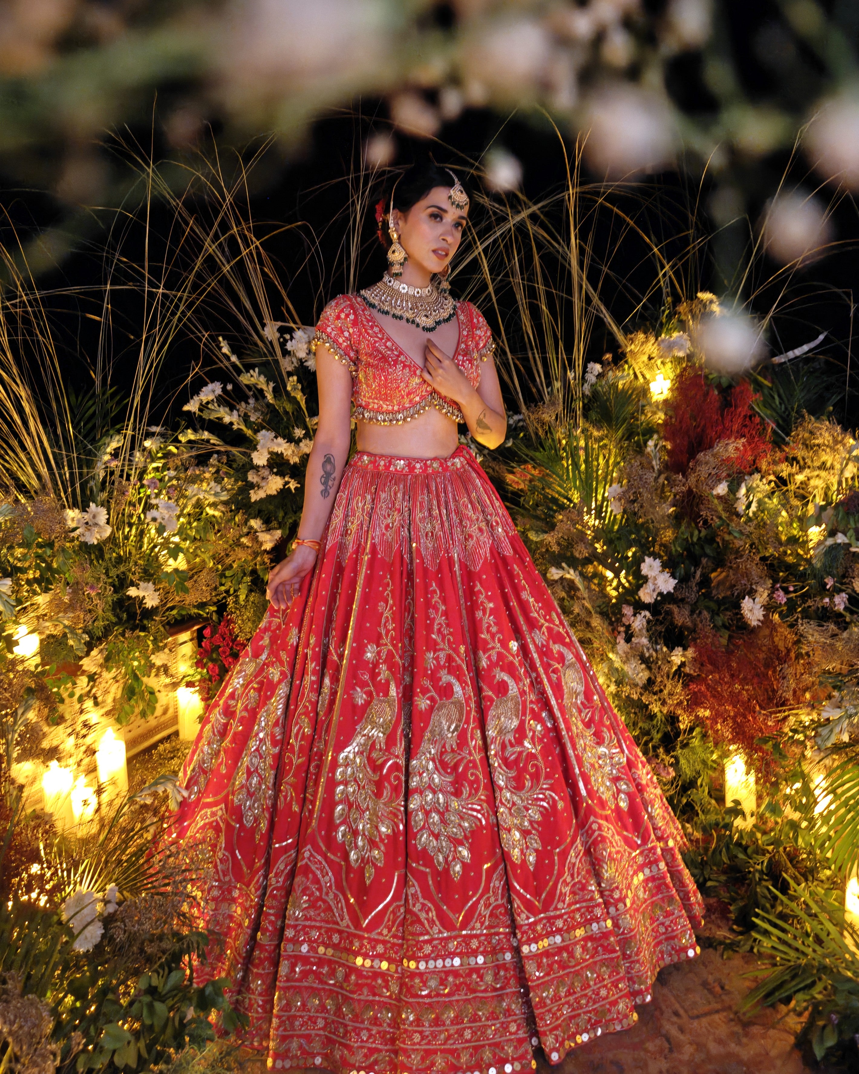 Laleh red silk bridal lehenga, hand embroidered by Amaltas Couture, front view