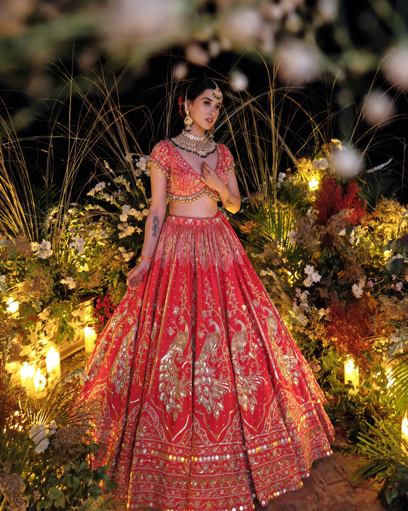 Laleh red silk bridal lehenga, hand embroidered by Amaltas Couture, front view