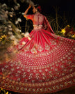 Anisa red silk bridal lehenga, cutdana and sequins embroidery detail, Amaltas Couture