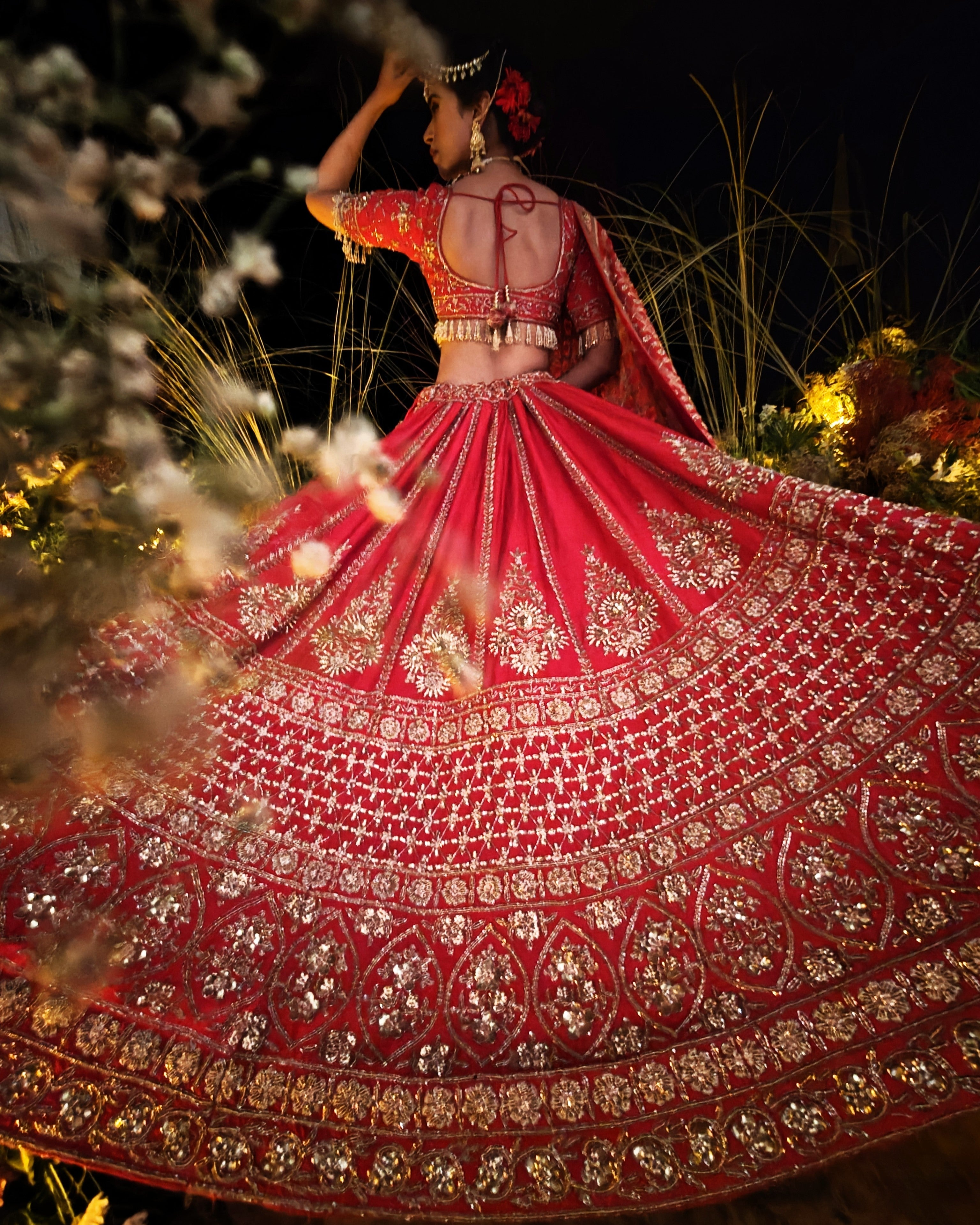 Anisa red silk bridal lehenga, cutdana and sequins embroidery detail, Amaltas Couture