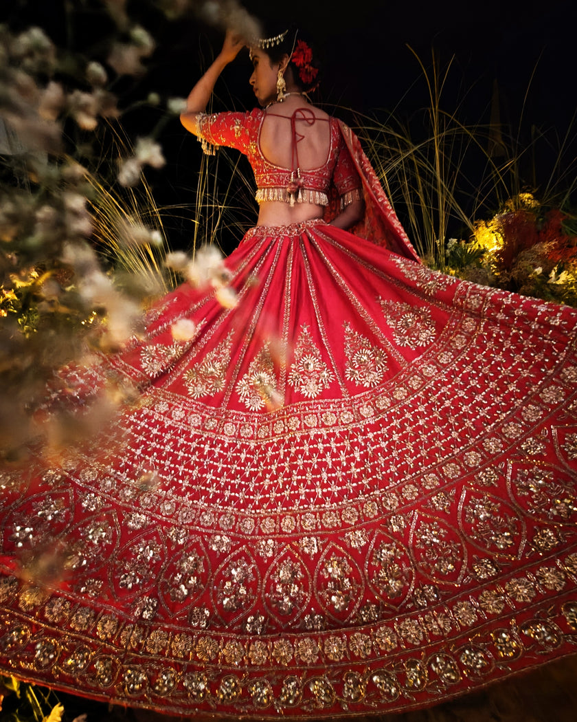 Anisa red silk bridal lehenga, cutdana and sequins embroidery detail, Amaltas Couture