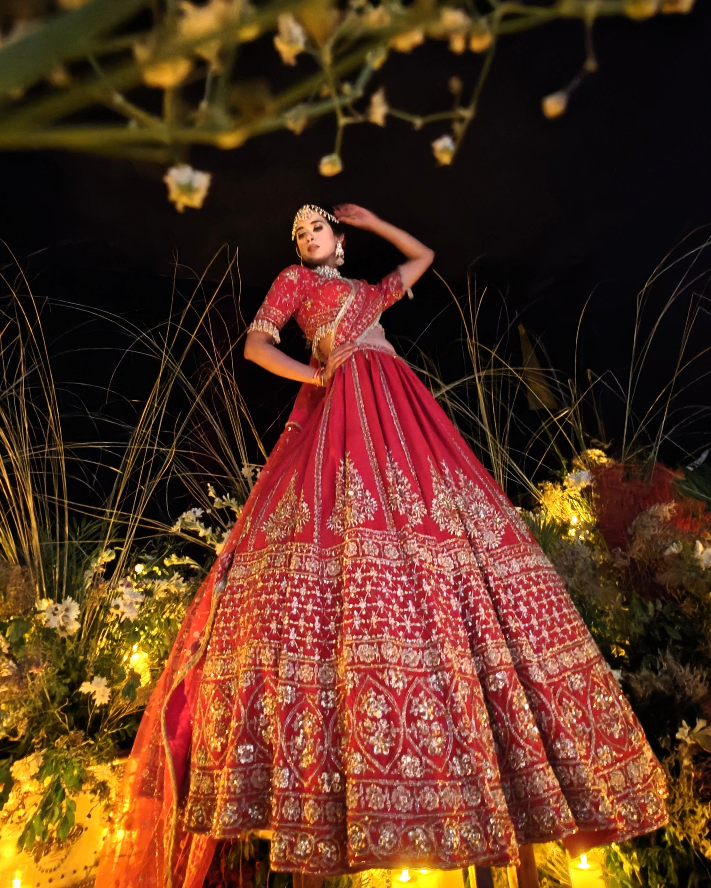 Anisa red silk bridal lehenga, back view, Amaltas Couture