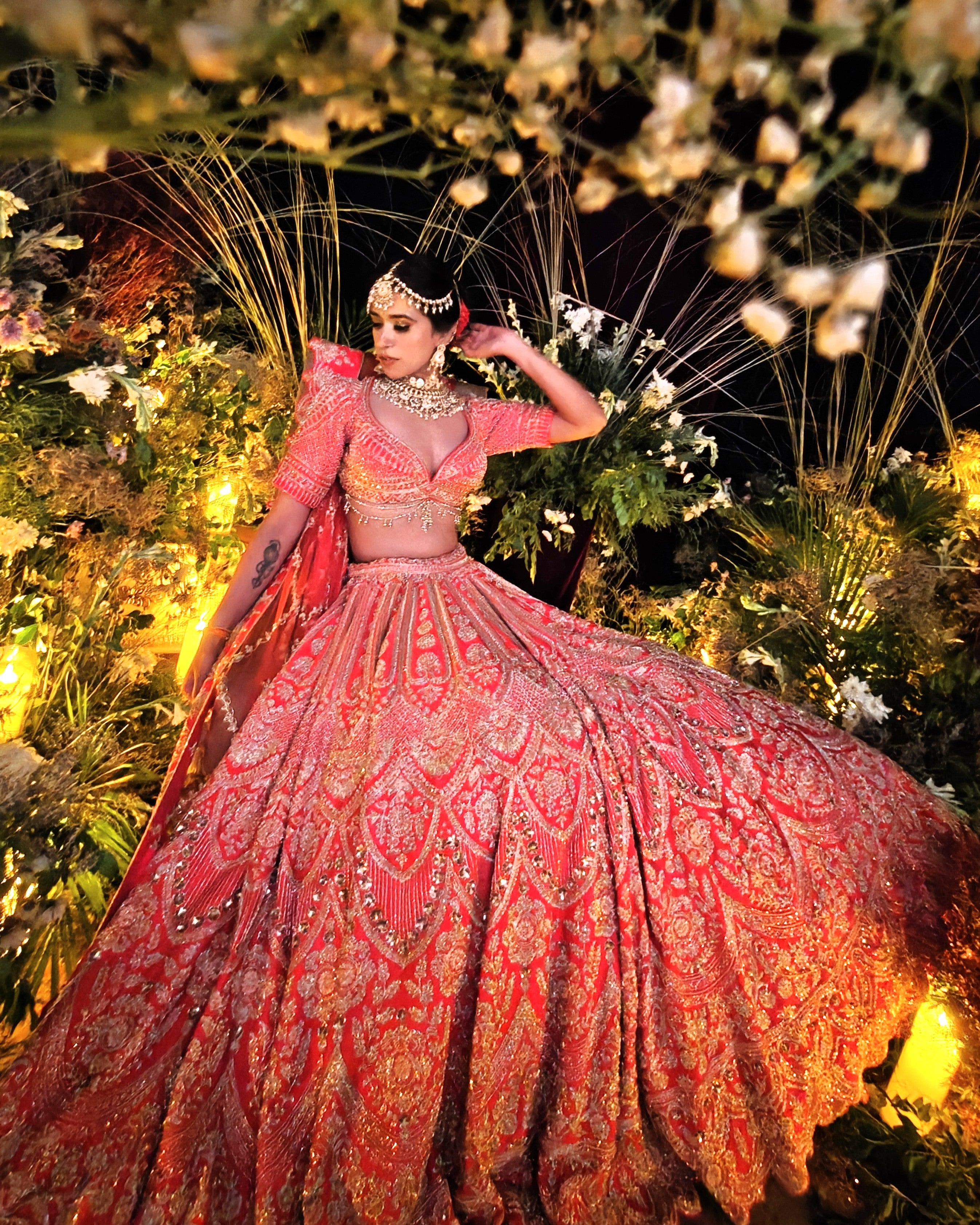 Sitara coral red silk bridal lehenga, hand embroidered by Amaltas Couture, front view