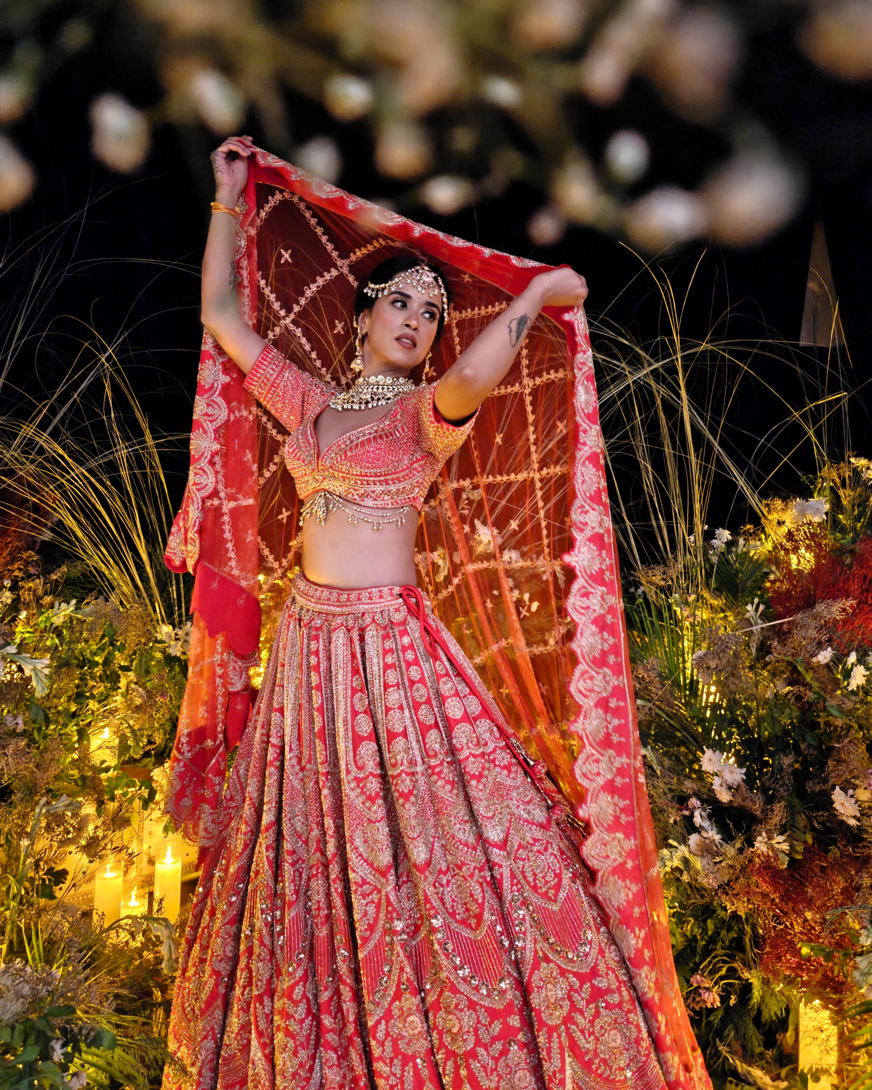 Sitara coral red silk bridal lehenga, back view, Amaltas Couture