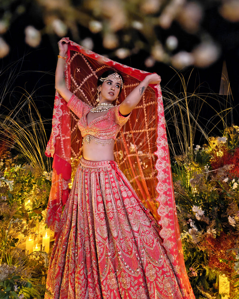 Sitara coral red silk bridal lehenga, back view, Amaltas Couture