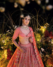 Sitara coral red silk bridal lehenga, full ghera flare, Amaltas Couture