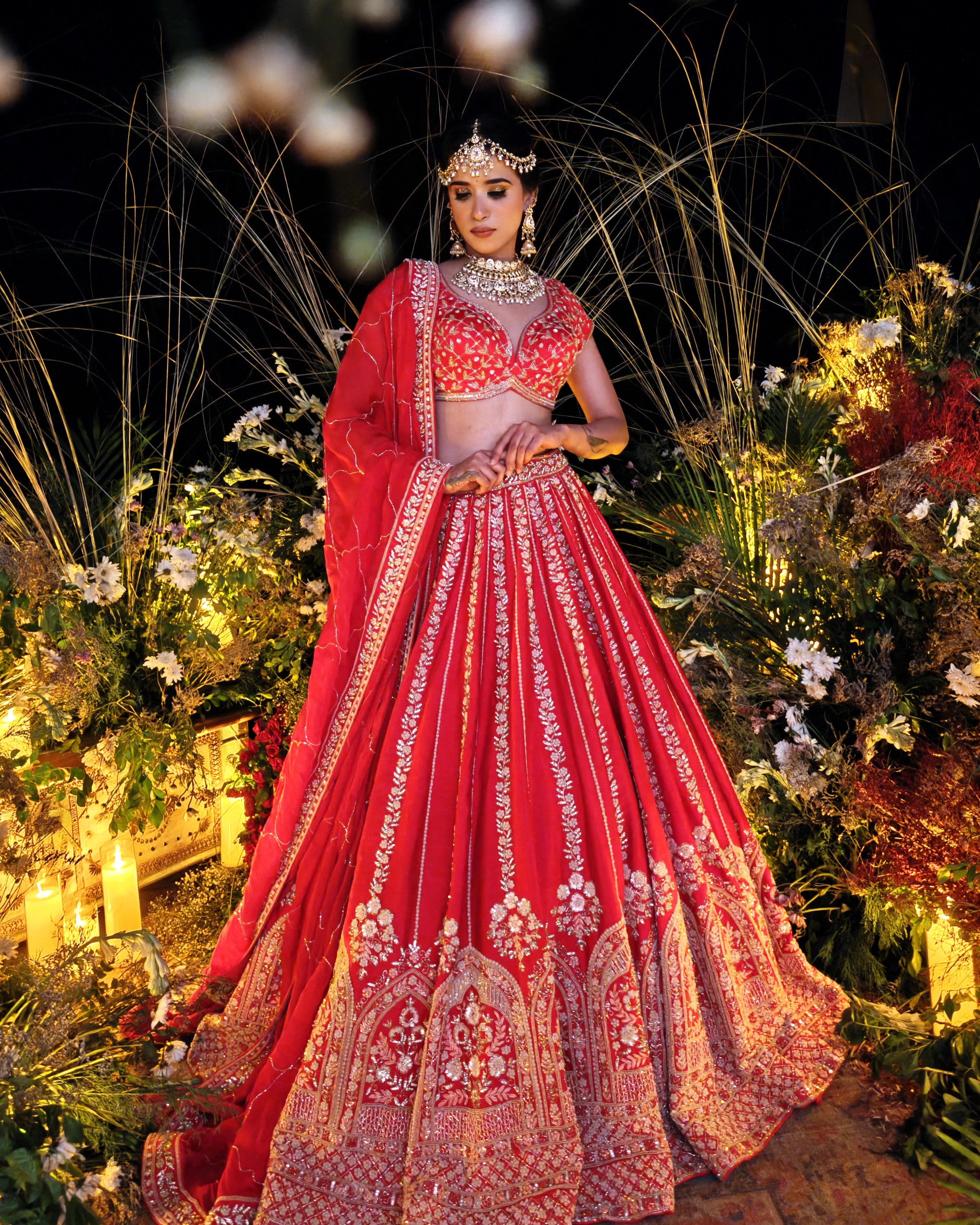 Soraya red silk bridal lehenga, hand embroidered by Amaltas Couture, front view