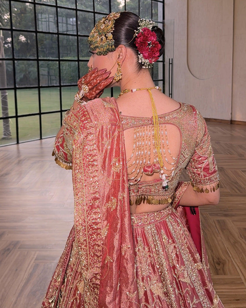Gulrang pink tissue lehenga blouse back, open back with latkans, Amaltas Couture