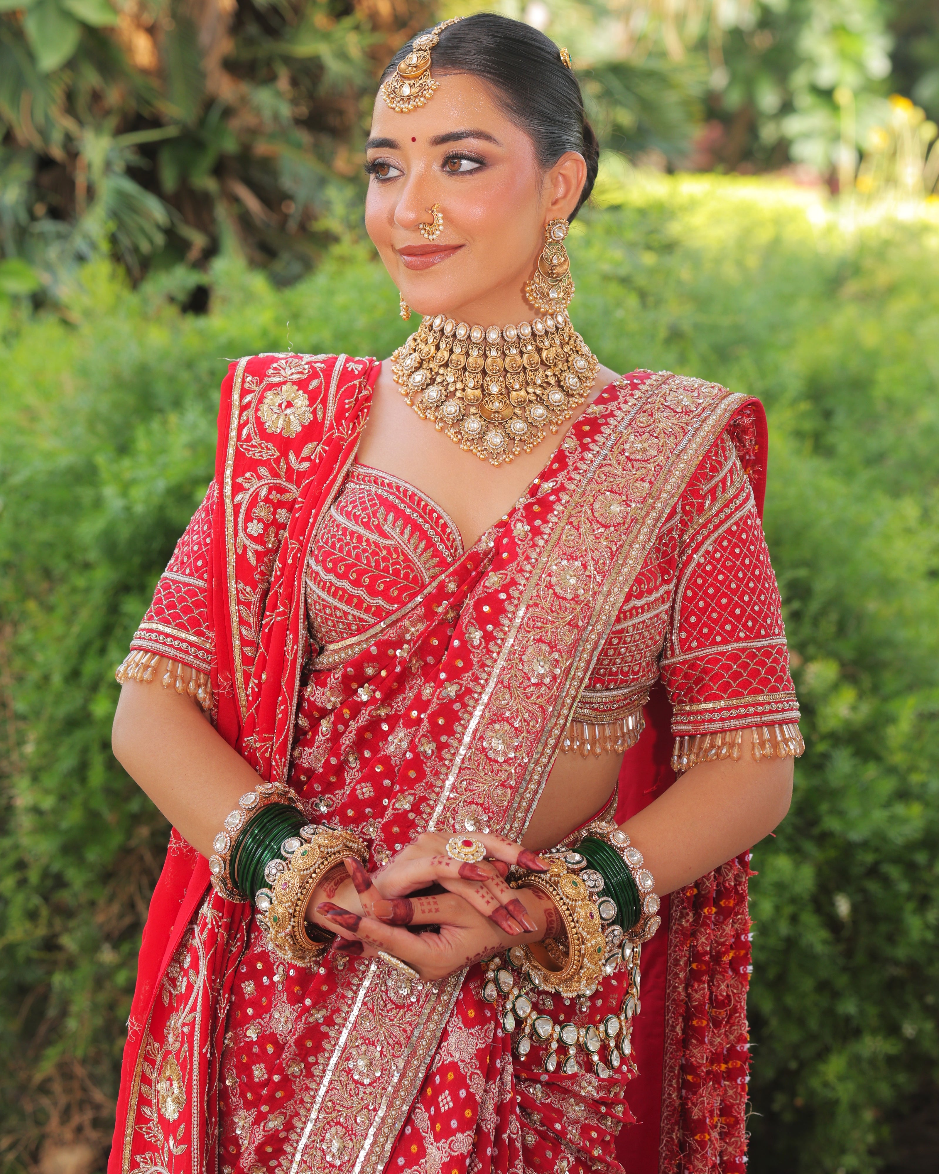 Meera red bandhej saree, hand embroidered blouse and pallu close up, Amaltas Couture
