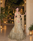 Zarina gold bridal lehenga, embellished blouse with beaded latkans on the cap sleeves, Amaltas Couture